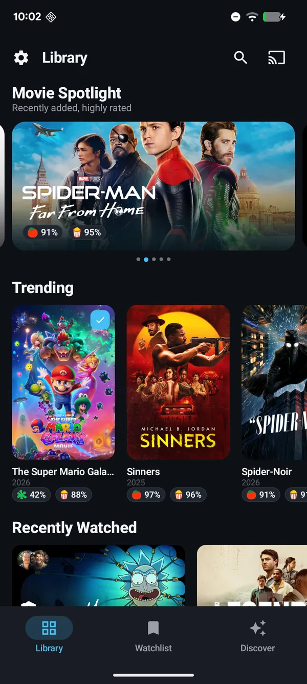 A Movie Spotlight hero banner above a Trending row in a Poptonium Plex library